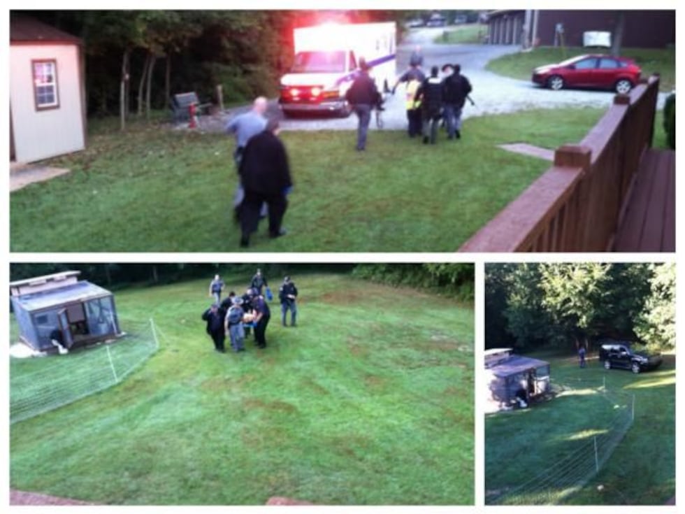 Homeowner Nila Kotlarich took these photos of officers carrying the suspect, Joseph Thomas...