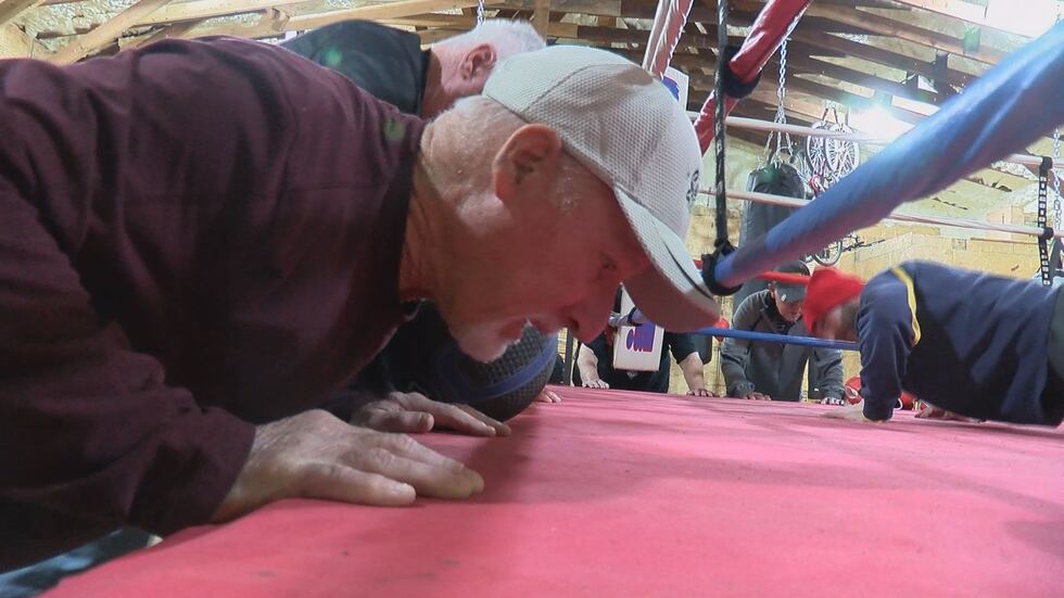 Parkinson's patients warming up before boxing class.