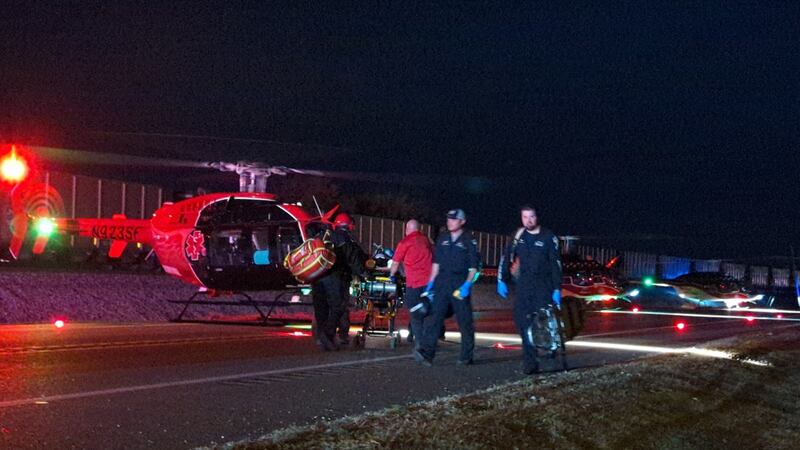 Two people were flown to the hospital Monday after a train crashed into a car south of Osceola.