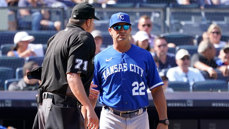 Kansas City Royals manager Mike Matheny (22) talks to Jordan Baker (71) during the sixth...