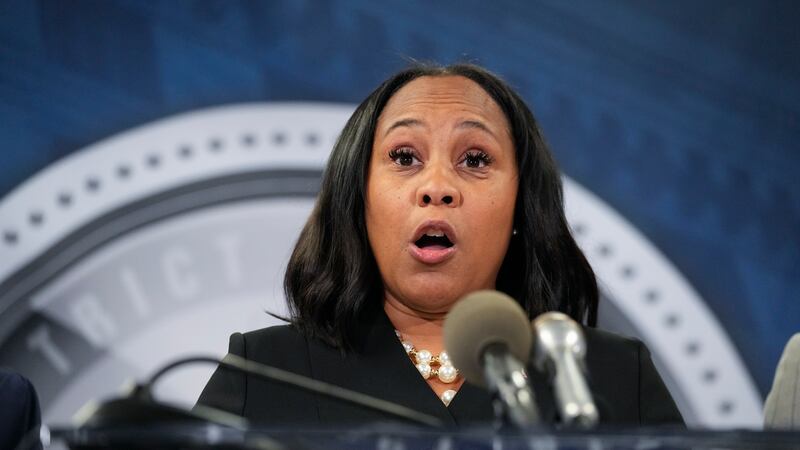 FILE - Fulton County District Attorney Fani Willis speaks in the Fulton County Government...