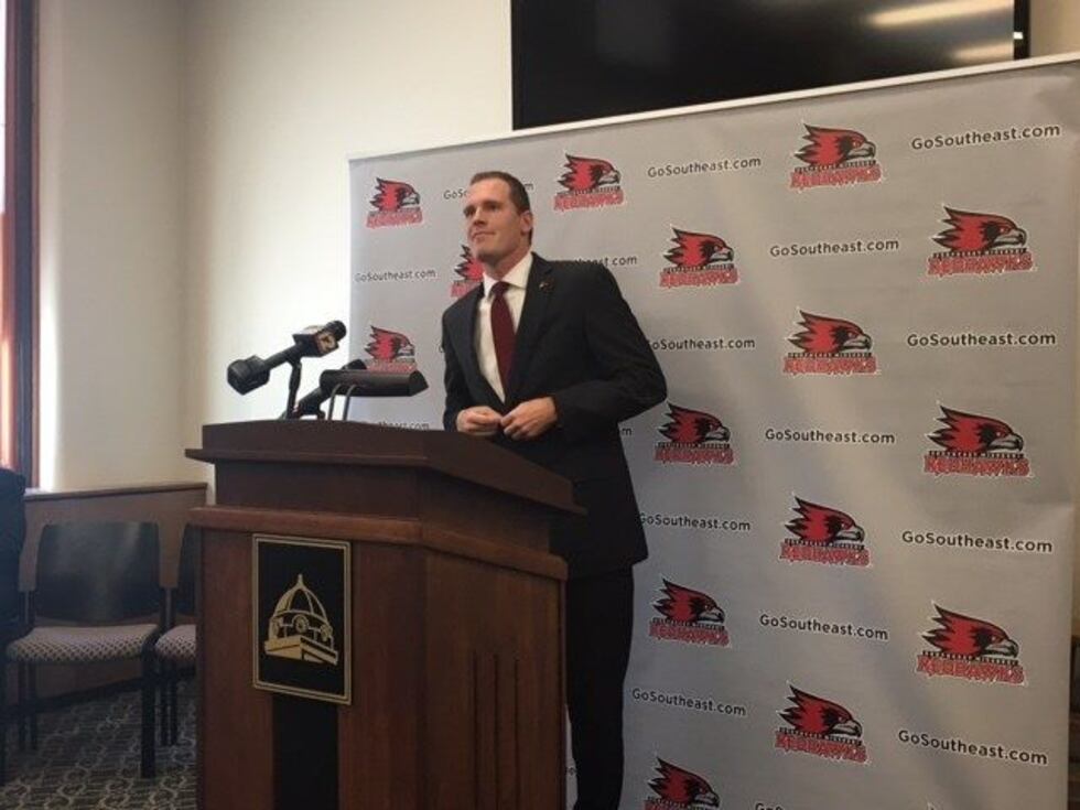 Brady Barke talks during a press conference after he was announced as Athletic Director....
