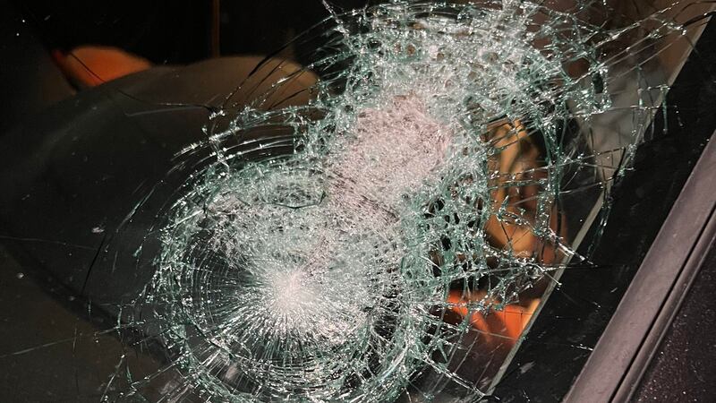 Damage left behind by rocks thrown into car